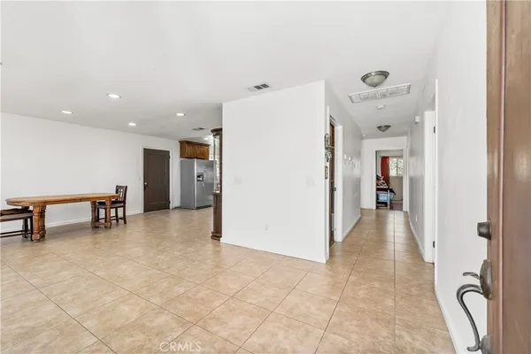 a view of room with furniture and a window