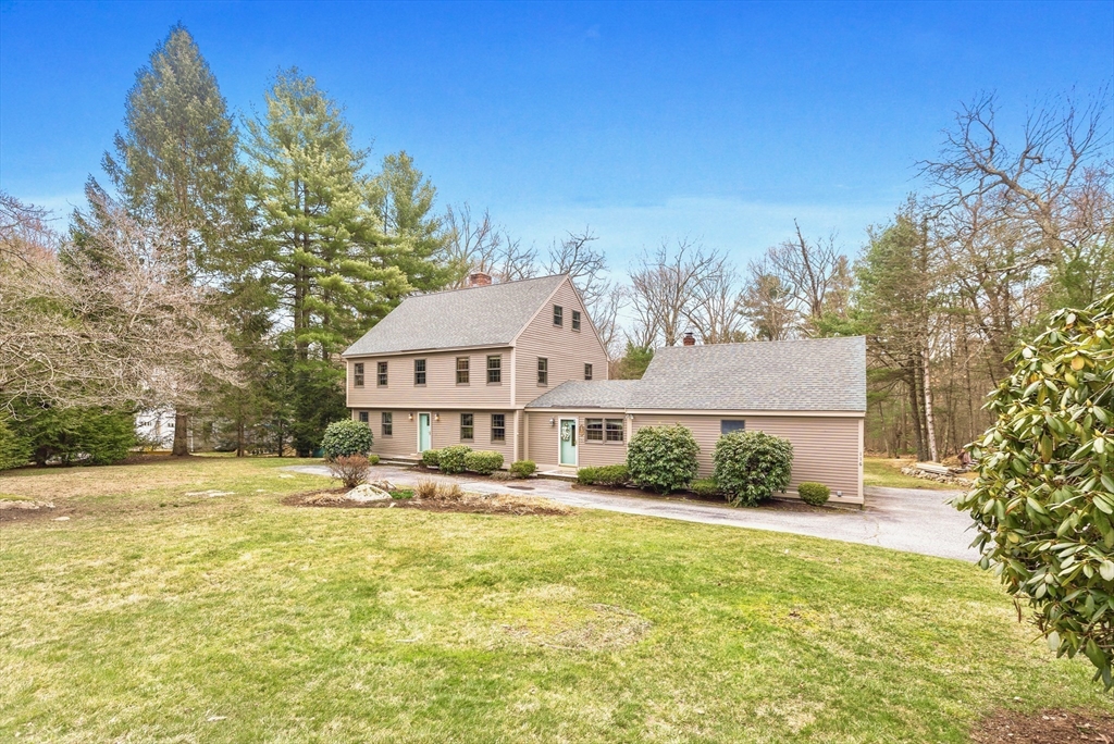 116 River Street Middleton, MA 01949 - Photo 1 of 32 a front view of a house with a yard
