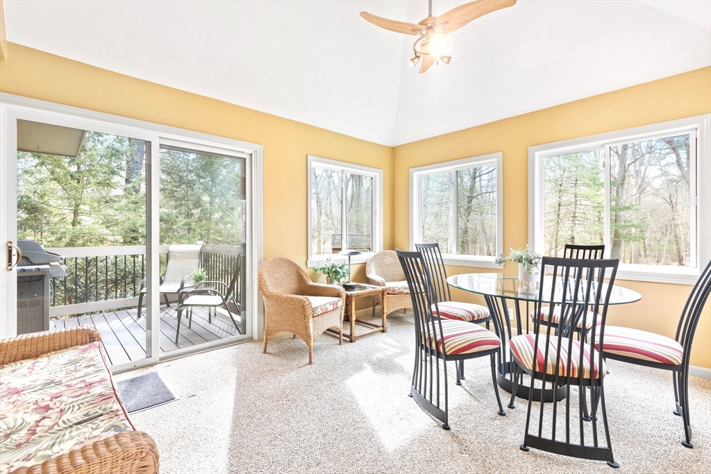 116 River Street Middleton, MA 01949 - Photo 15 of 32 a dining room with furniture a chandelier and wooden floor
