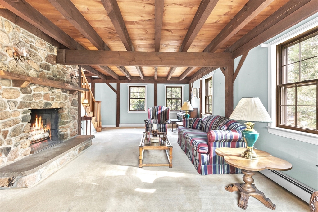116 River Street Middleton, MA 01949 - Photo 3 of 32 a living room with furniture a window and a chandelier