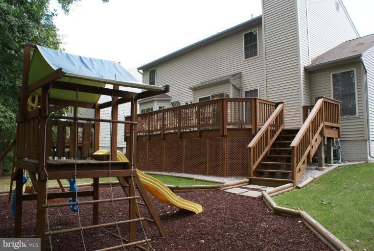 9244 Homestretch Court Laurel, MD 20723 - Photo 26 of 27 Back Yard with Playground Equipment