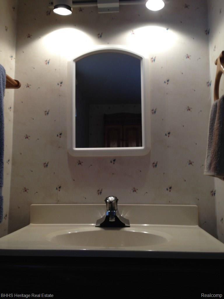 7351 Cowell Road Brighton, MI 48116 - Photo 14 of 16 1/2 bath in lower level