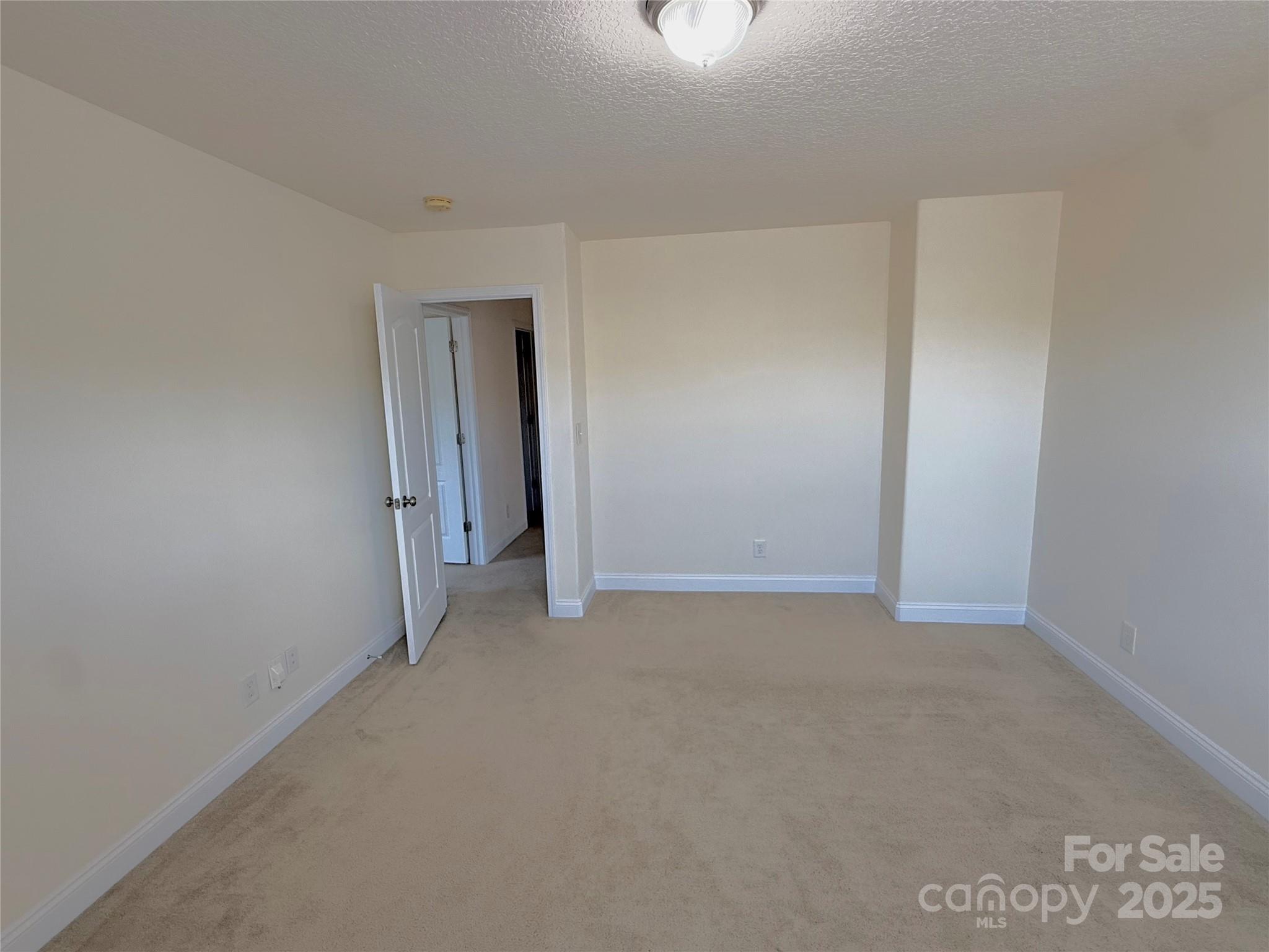 7534 April Mist Trail Huntersville, NC 28078 - Photo 45 of 47 a view of an empty room