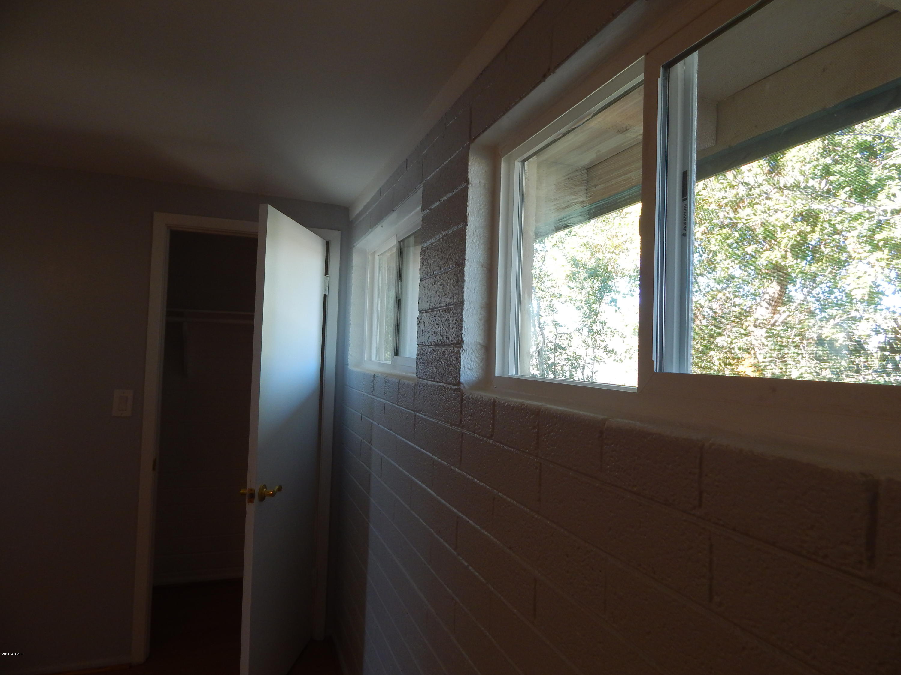 2025 South Granada Drive, Unit 12 Tempe, AZ 85282 - Photo 10 of 35 a view of hallway with windows