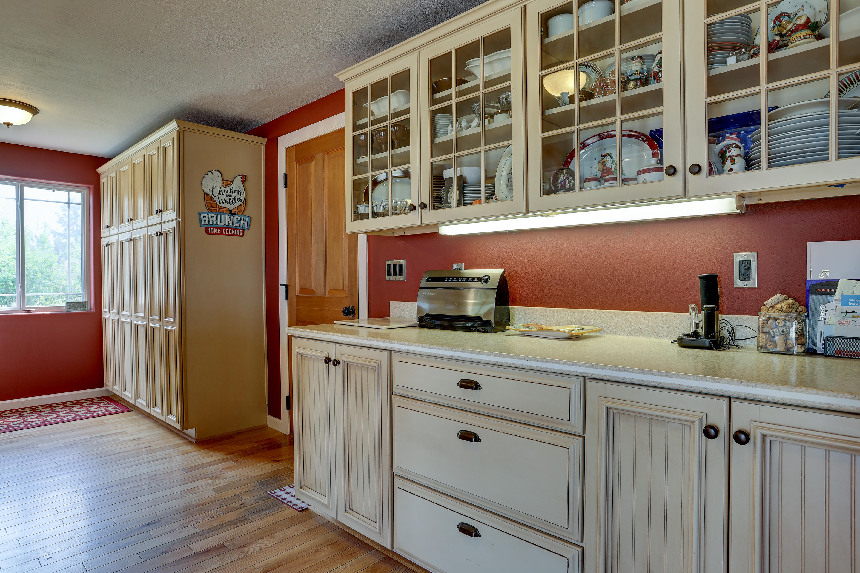 60875 Billadeau Road Bend, OR 97702 - Photo 16 of 42 a kitchen with stainless steel appliances granite countertop a refrigerator and a sink