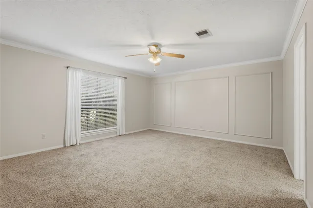 a bathroom with a granite countertop sink a mirror and a bathtub