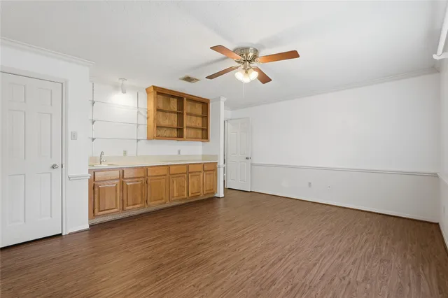 a bathroom with a bathtub and a sink