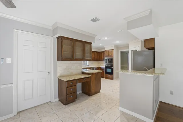 workspace with wooden floor and door