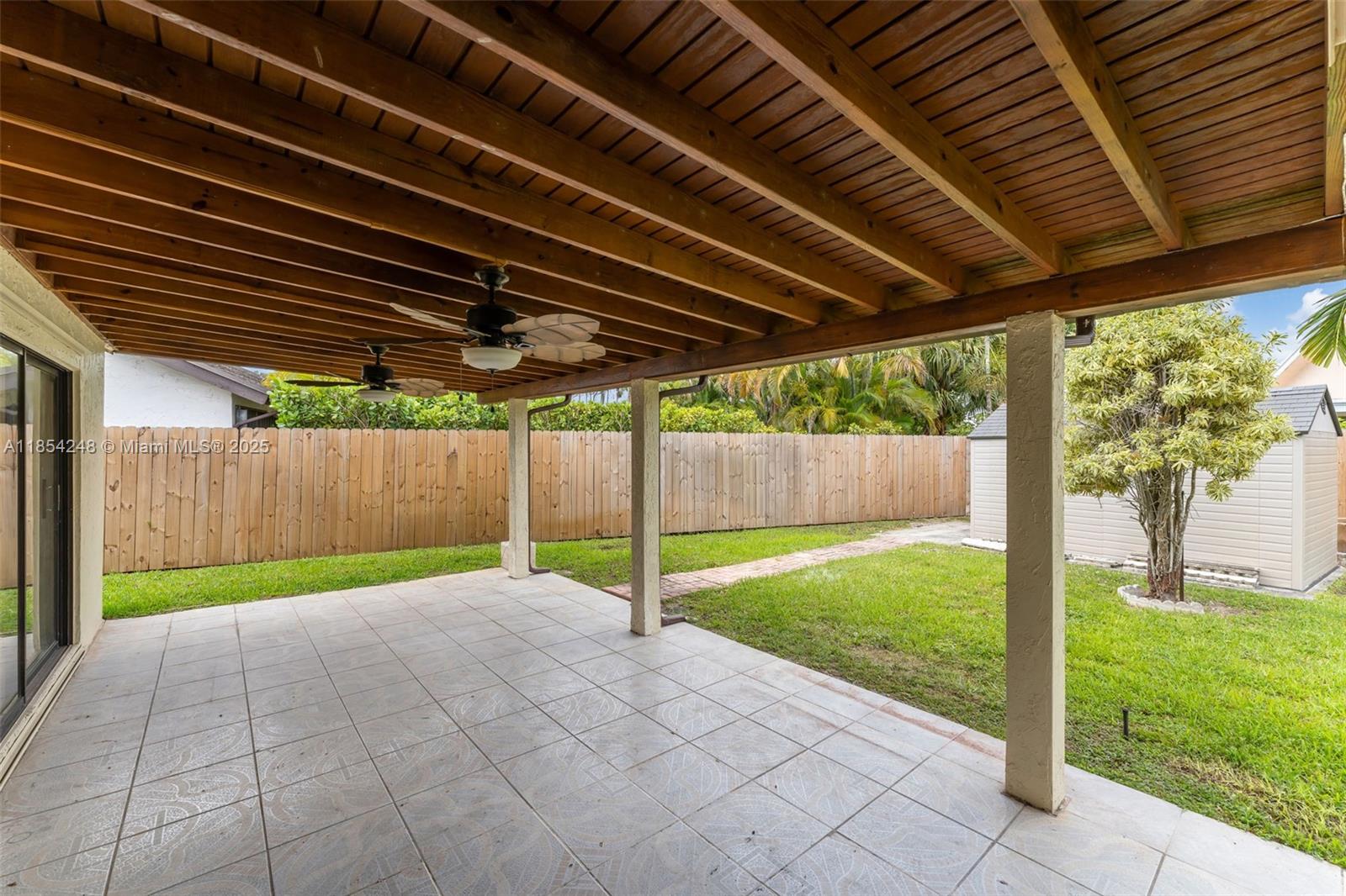 9130 Southwest 101st Avenue Miami, FL 33176 - Photo 26 of 35 a view of backyard with green space