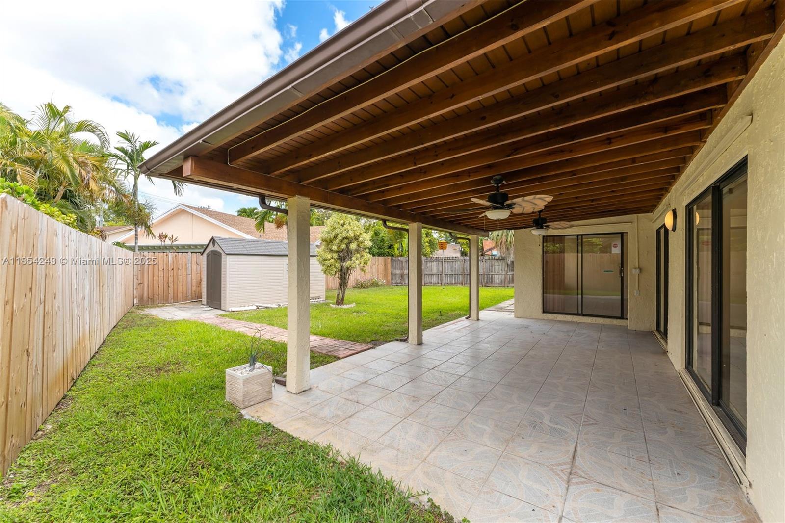 9130 Southwest 101st Avenue Miami, FL 33176 - Photo 27 of 35 a view of a backyard of the house