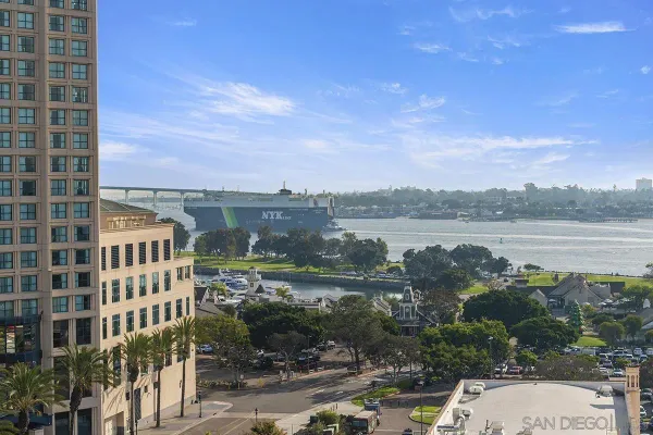 a view of a lake with building in front of it