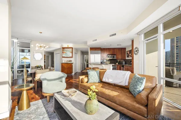 a view of living room kitchen with furniture and a table