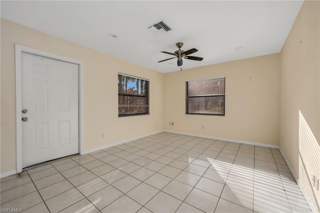 5191 Mahogany Ridge Drive Naples, FL 34119 - Photo 16 of 18 a view of empty room with window