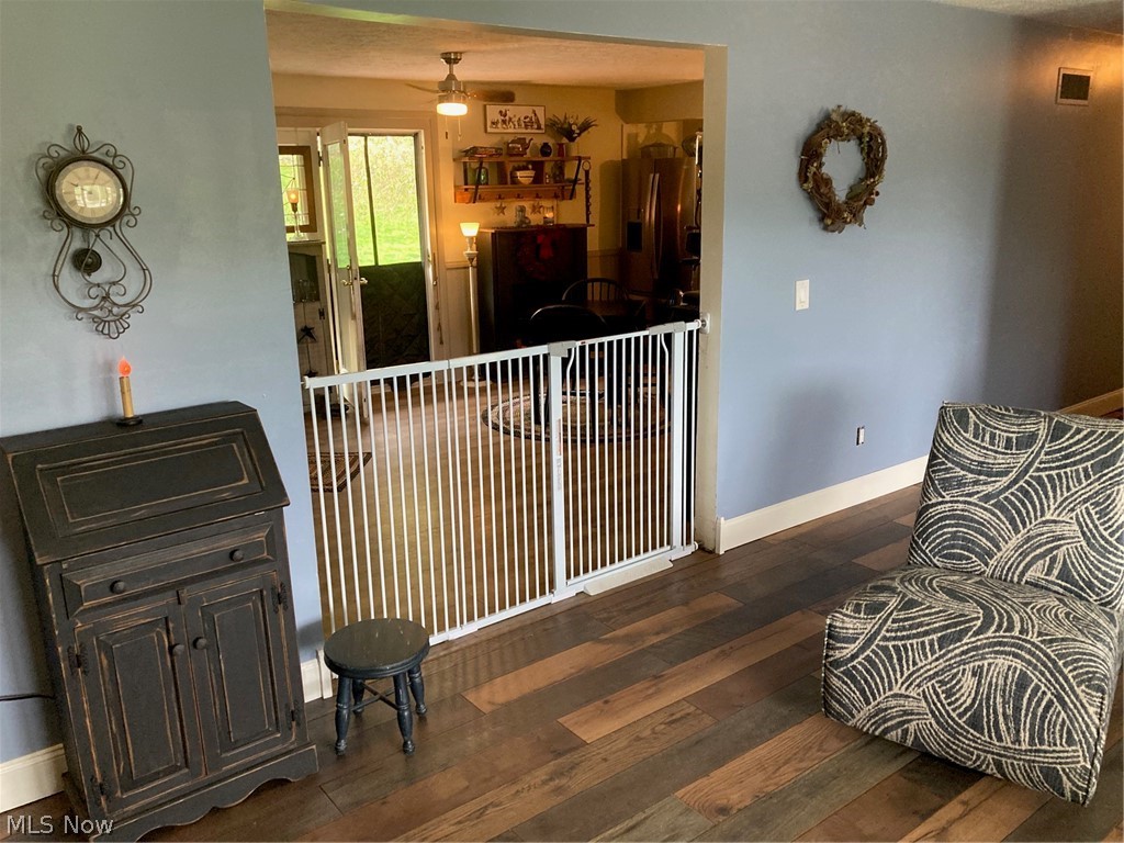202 Ridgewood Boulevard Minerva, OH 44657 - Photo 4 of 38 Living room to kitchen