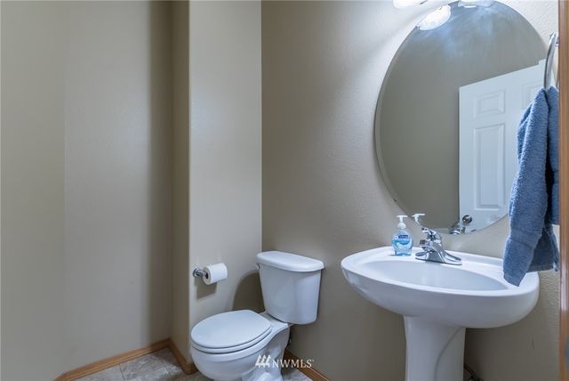 a bathroom with a sink and a toilet
