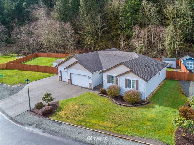 a house that has a lot of plants in it
