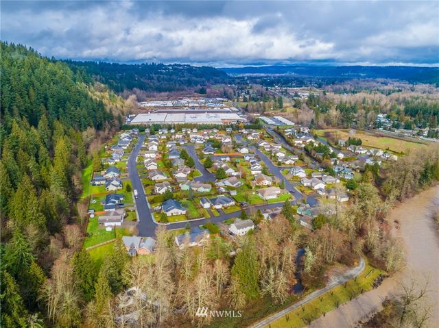 a view of a yard with an outdoor seating