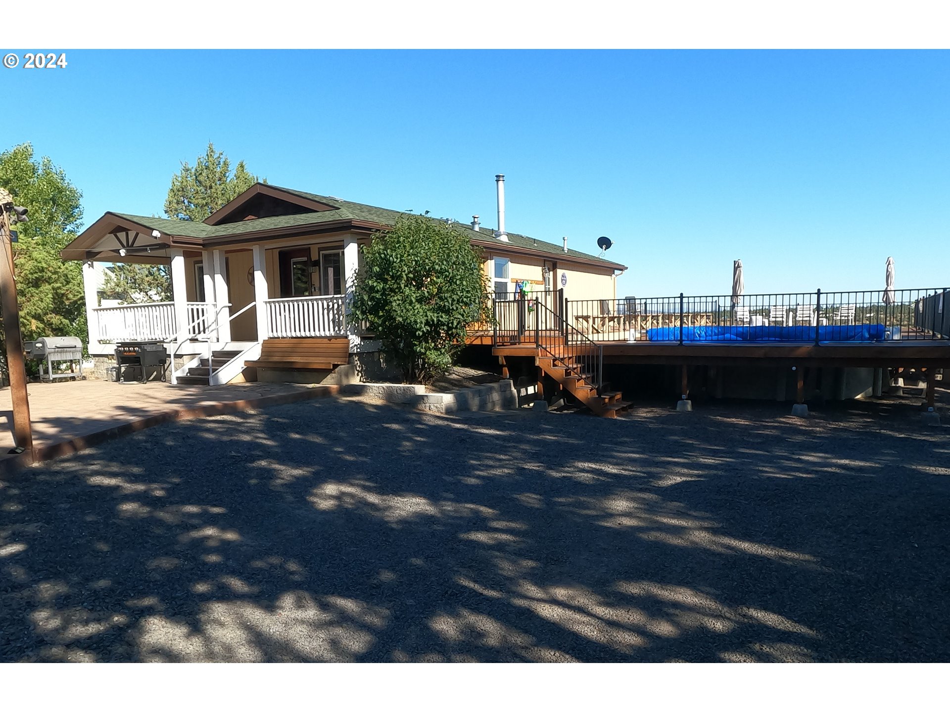 11175 Southwest Pixie Lane Culver, OR 97734 - Photo 2 of 33 a view of a house with a patio