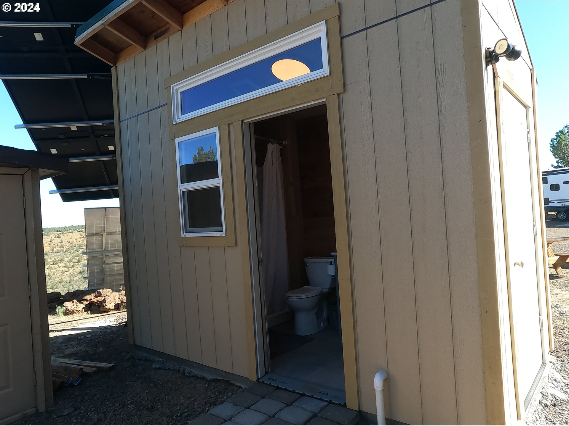 11175 Southwest Pixie Lane Culver, OR 97734 - Photo 25 of 33 a bathroom with a toilet