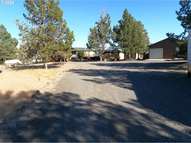 a view of a house with a garden