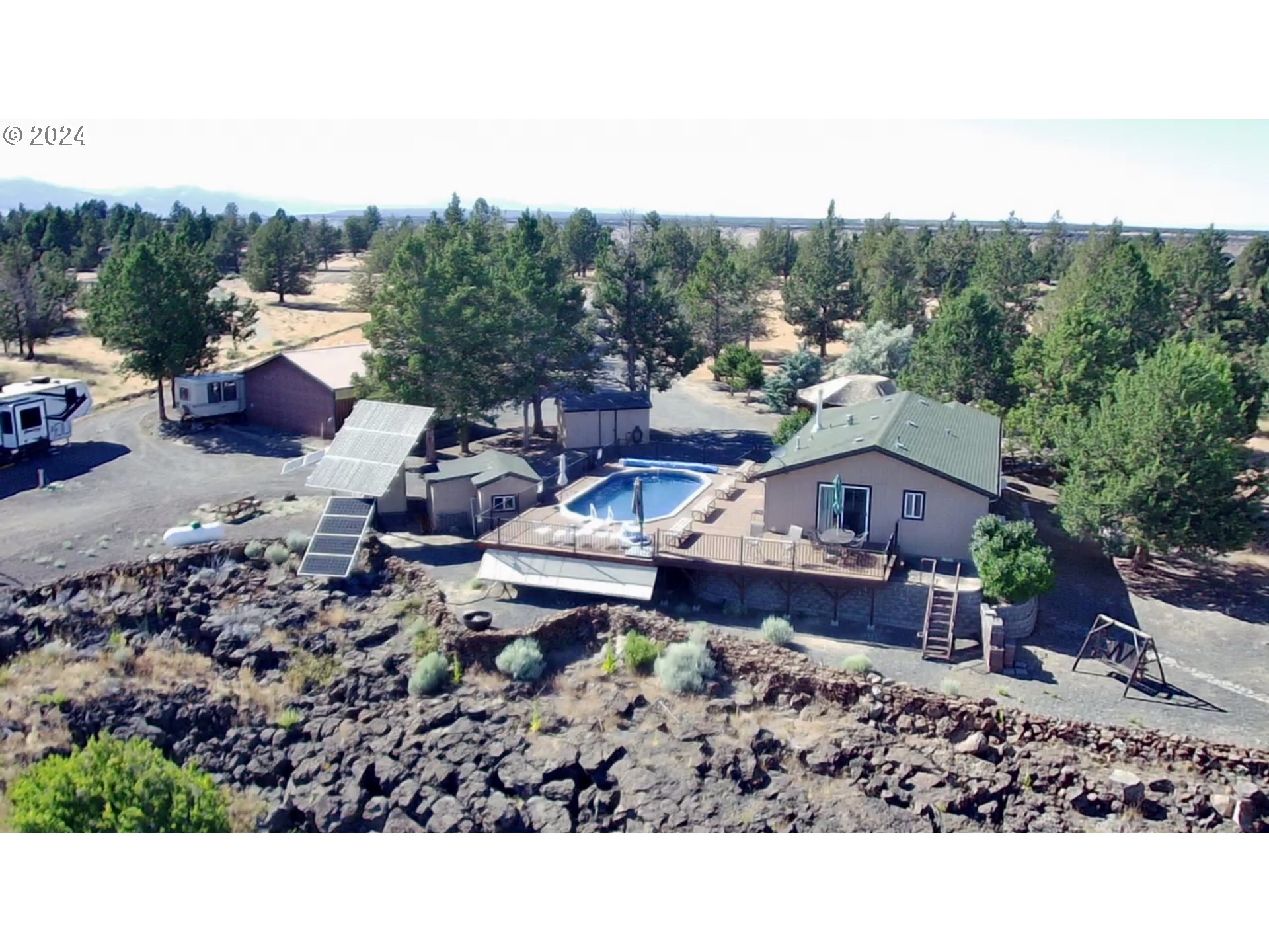 11175 Southwest Pixie Lane Culver, OR 97734 - Photo 33 of 33 a view of a house with a garden