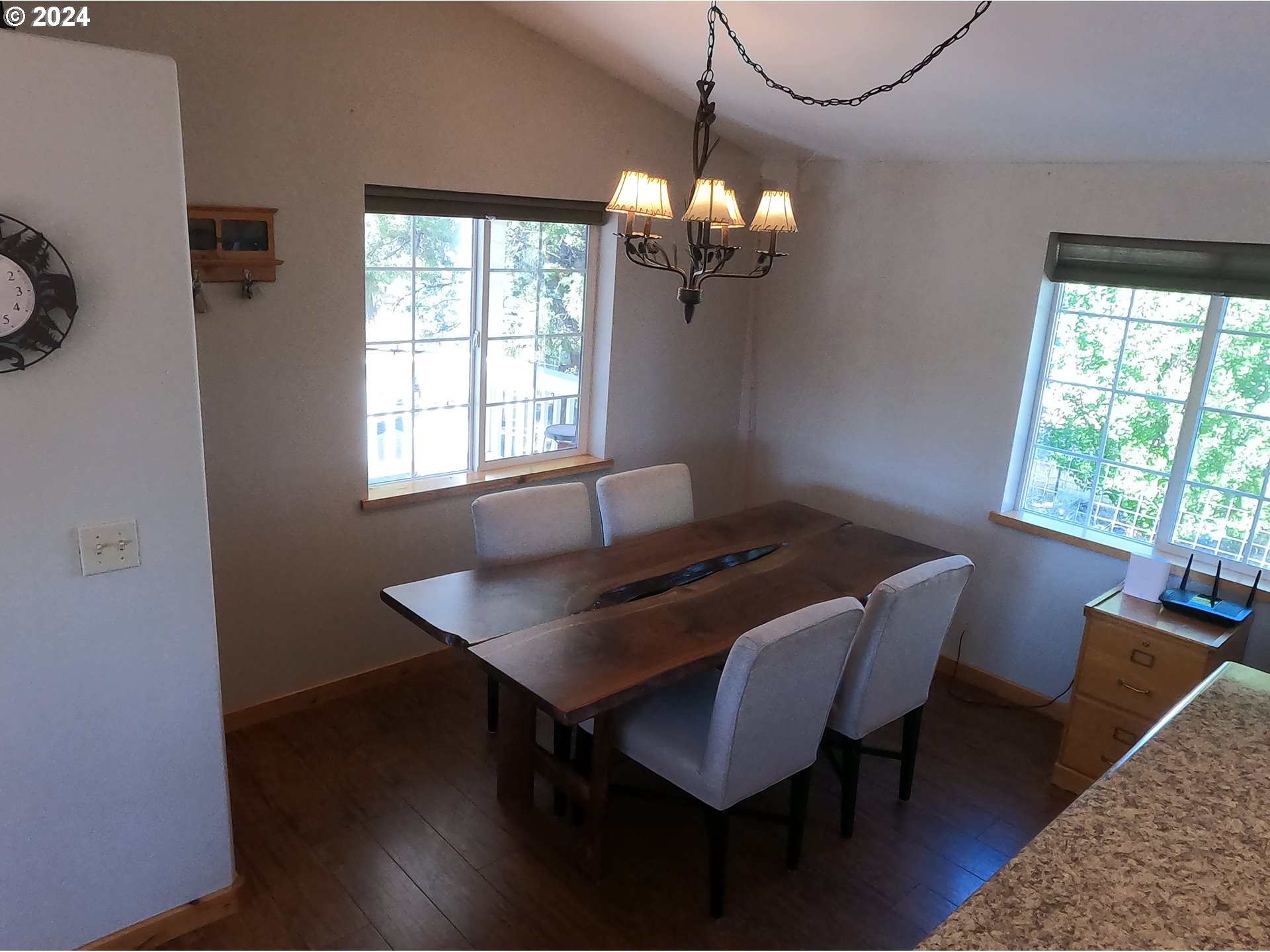 11175 Southwest Pixie Lane Culver, OR 97734 - Photo 8 of 33 a view of a dining room with furniture window and wooden floor