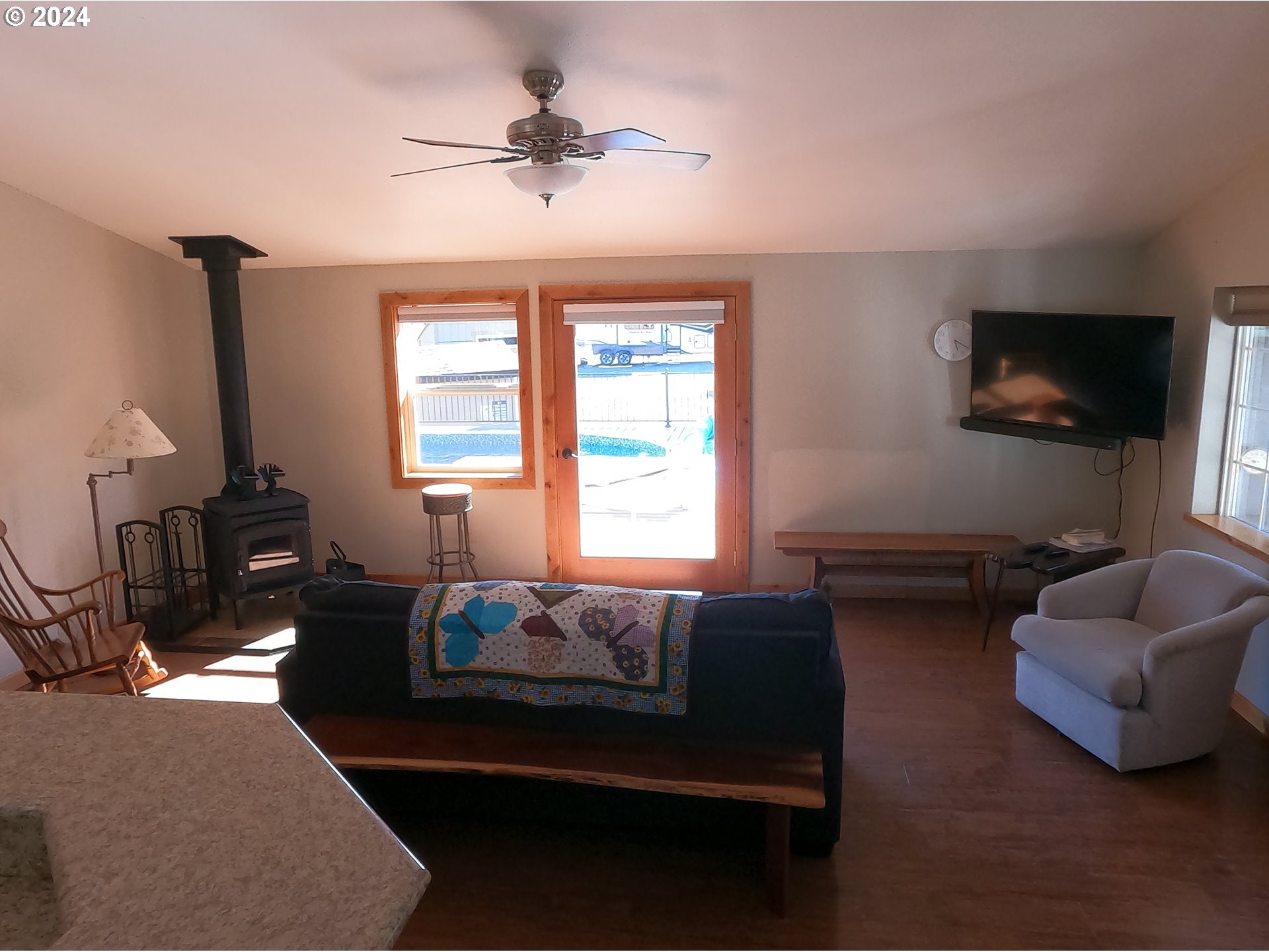 11175 Southwest Pixie Lane Culver, OR 97734 - Photo 9 of 33 a living room with furniture and a flat screen tv