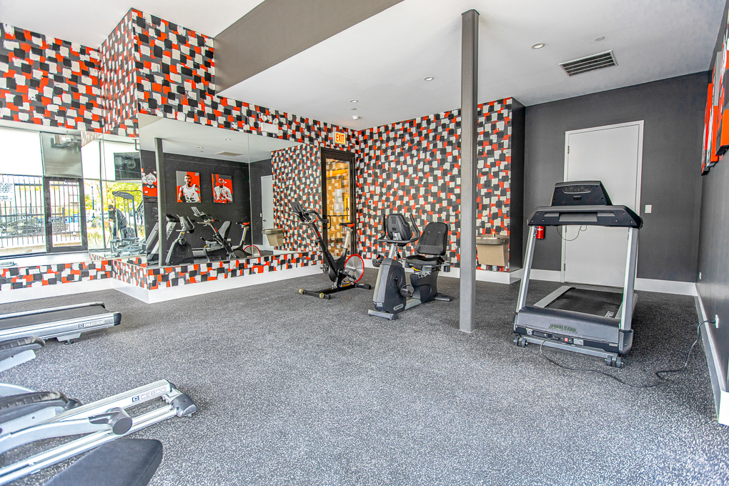 Undisclosed Address Chicago, IL 60640 - Photo 24 of 29 a room with gym equipment