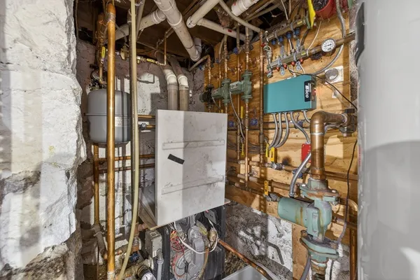 a view of a roof deck with table and chairs with wooden floor and fence