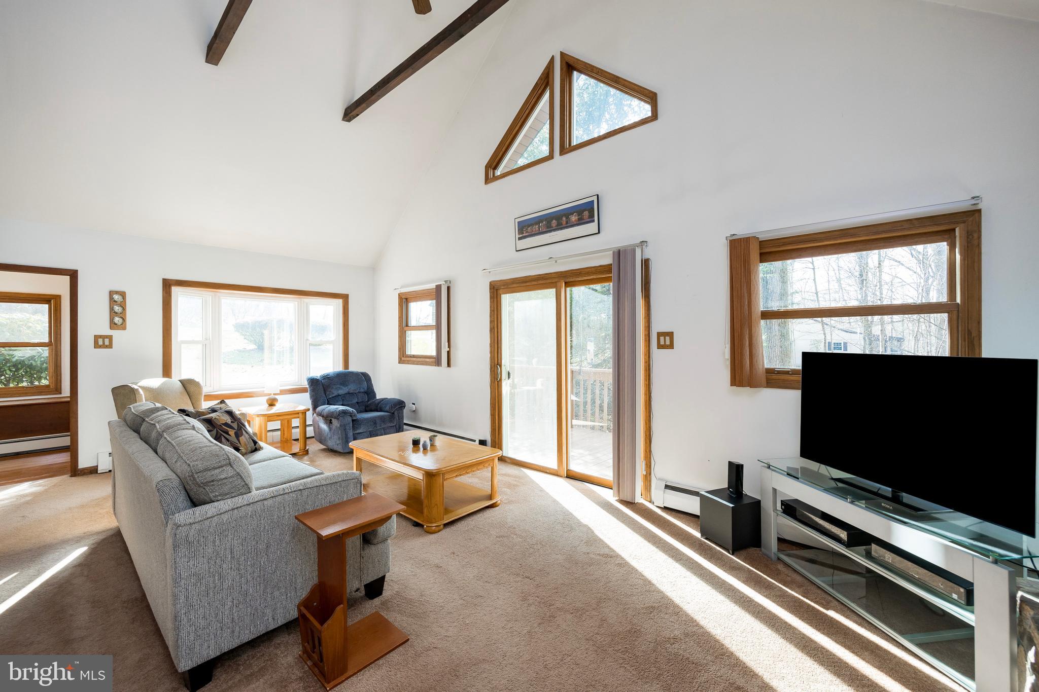 50 Lyndell Road Downingtown, PA 19335 - Photo 8 of 33 Great Room with vaulted/beamed ceiling