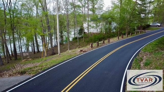 844 Stirling Road Camden, TN 38320 - Photo 28 of 29 a view of a wooden deck with a yard