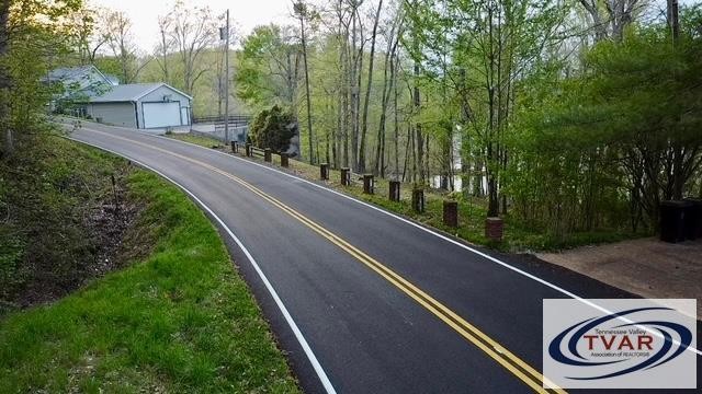 844 Stirling Road Camden, TN 38320 - Photo 29 of 29 a view of a street with a large trees