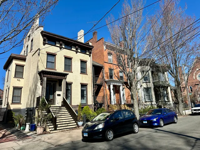 a car parked in front of a building