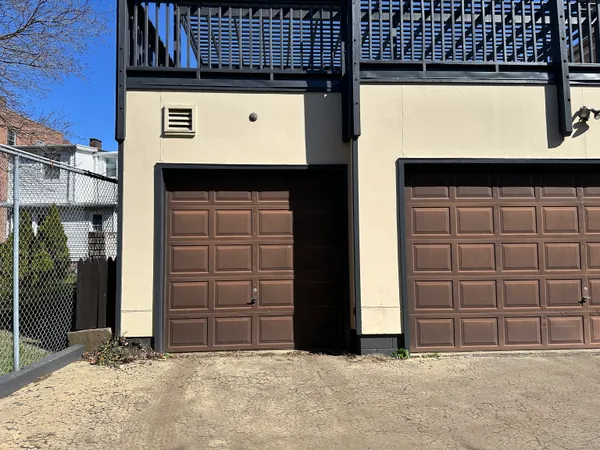 a view of outdoor space garage and window