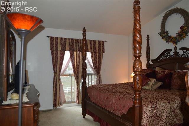 12455 Snaffle Bit Road Peyton, CO 80831 - Photo 20 of 30