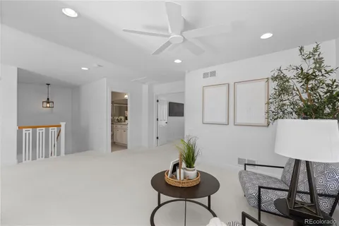 a view of kitchen with furniture and wooden floor