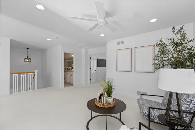 a view of kitchen with furniture and wooden floor