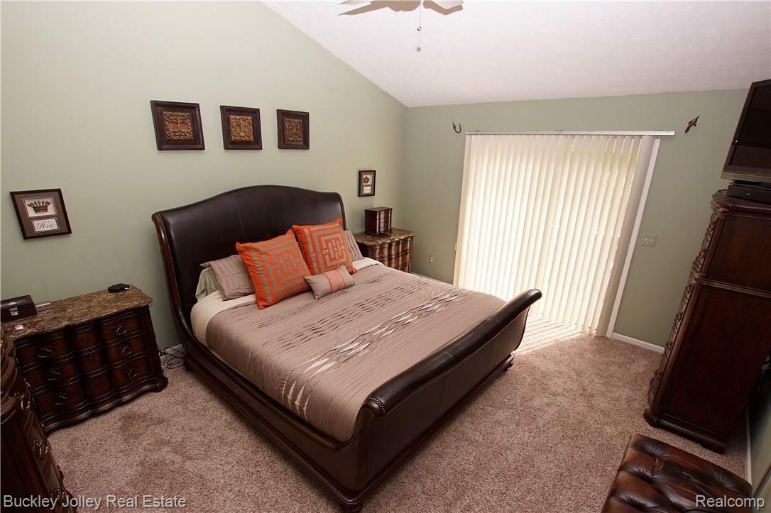 9490 Quail Ridge Run Brighton, MI 48114 - Photo 7 of 27 Master has Deck Access and Dual Walk-In Closets.JPG
