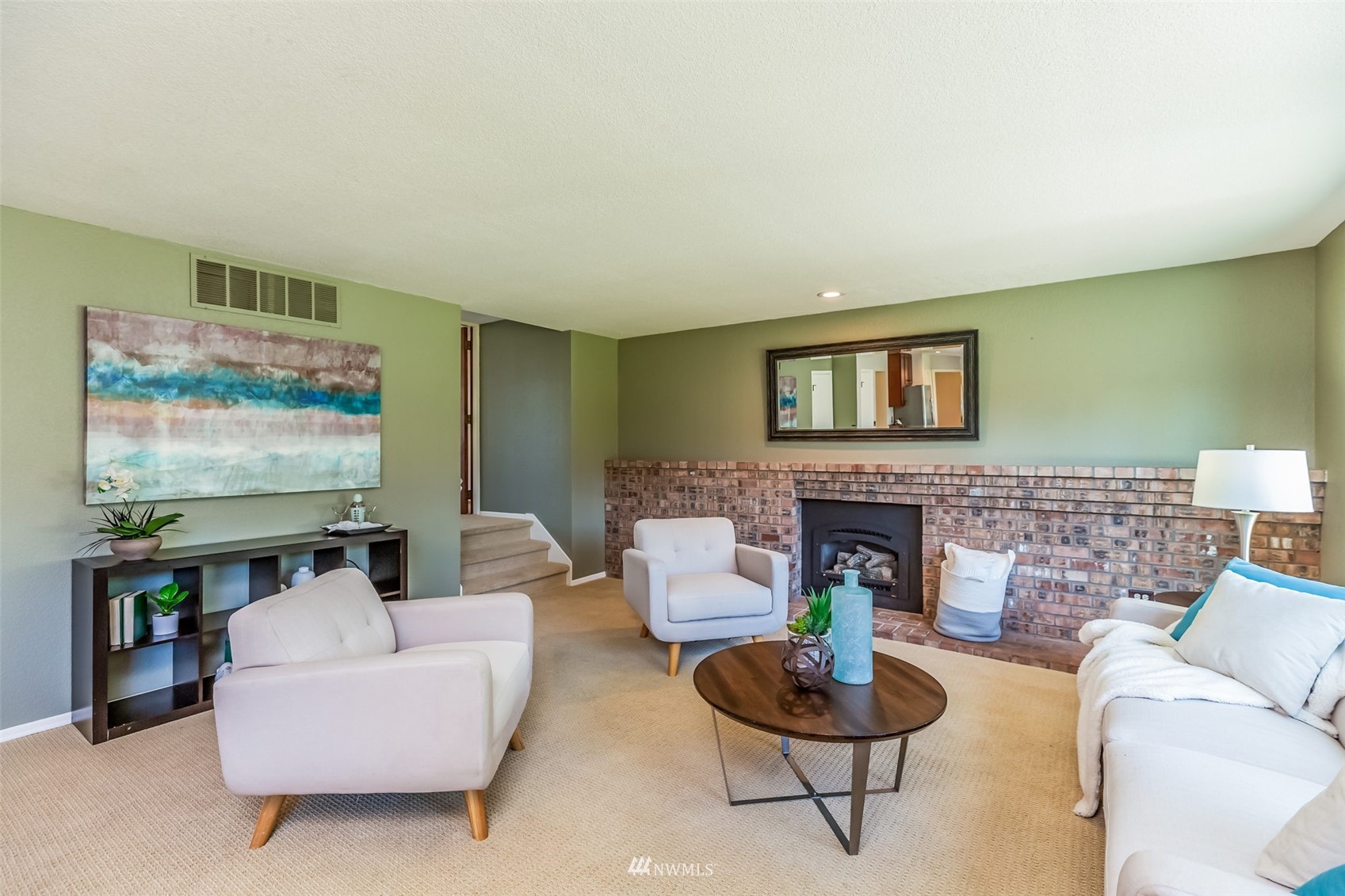 924 Goat Trail Loop Road Mukilteo, WA 98275 - Photo 12 of 40 a living room with furniture and a fireplace