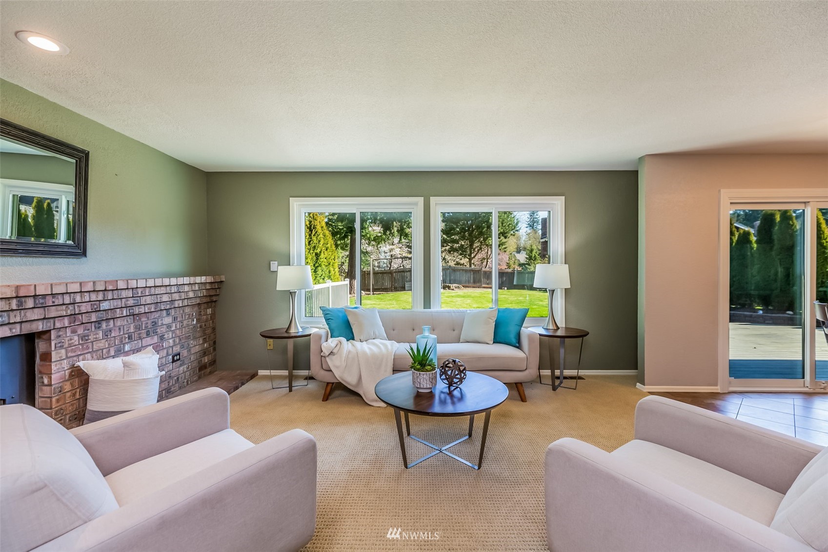 924 Goat Trail Loop Road Mukilteo, WA 98275 - Photo 13 of 40 a living room with furniture and a fireplace