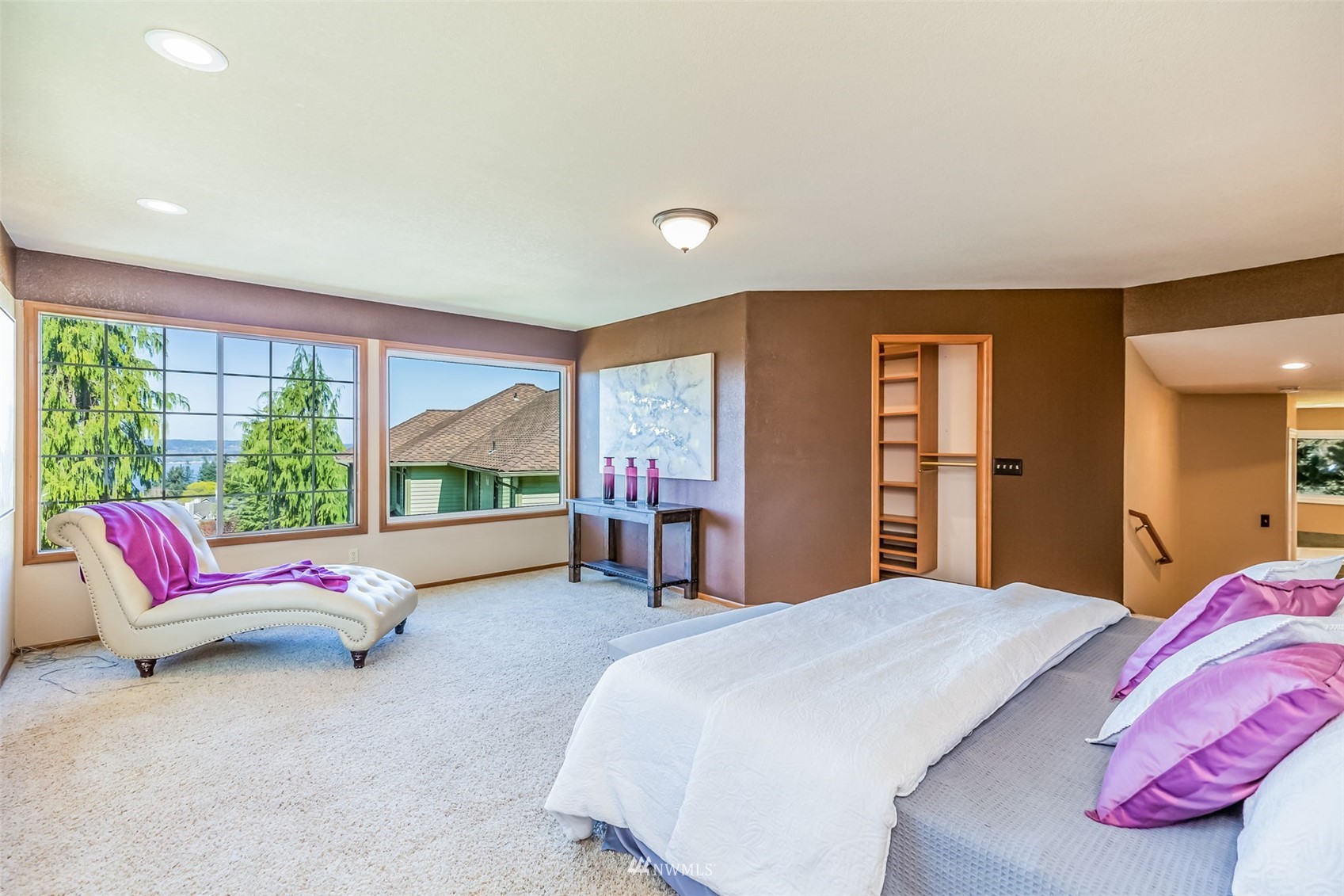 924 Goat Trail Loop Road Mukilteo, WA 98275 - Photo 18 of 40 a bedroom with a bed and large windows