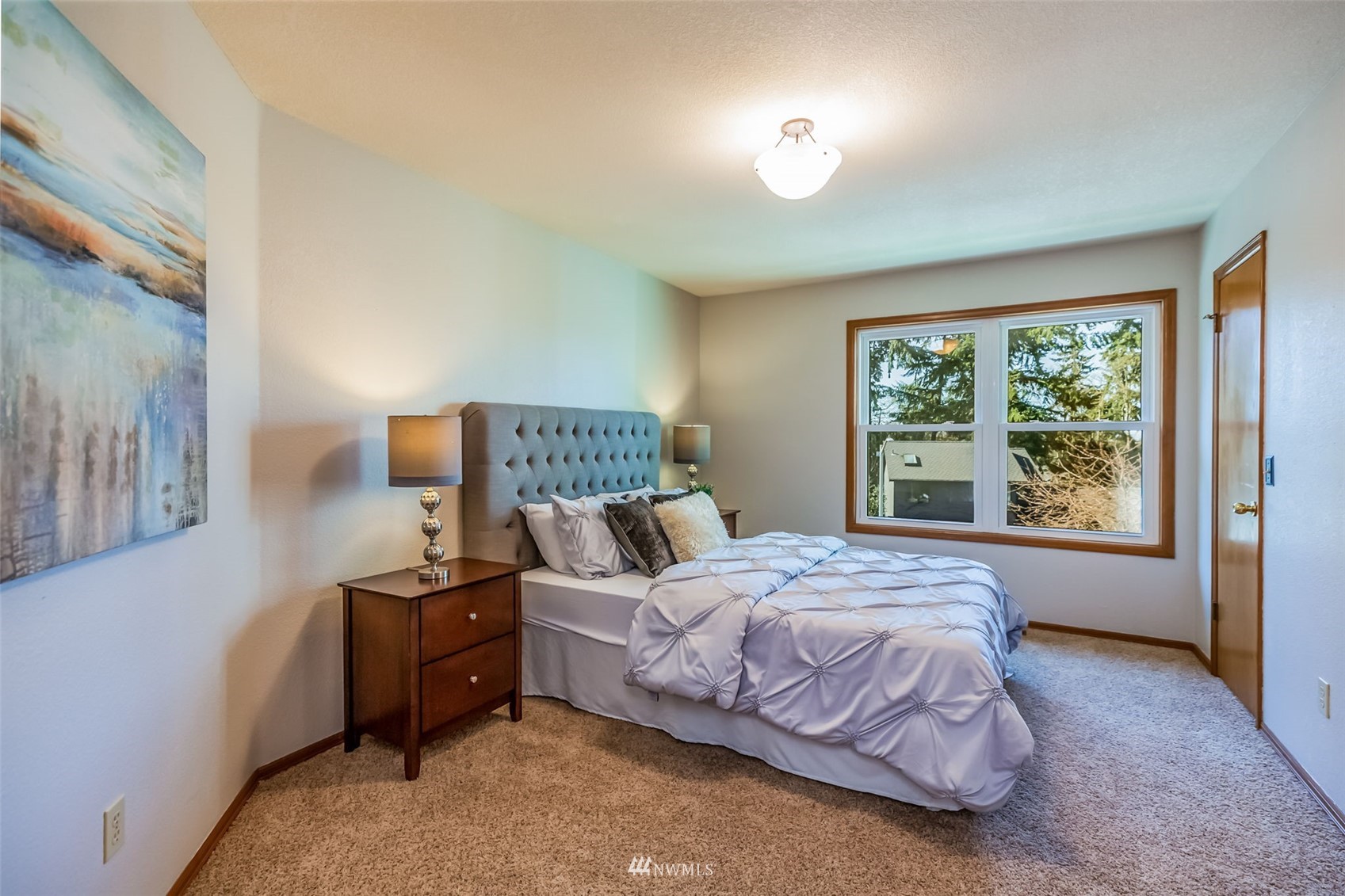 924 Goat Trail Loop Road Mukilteo, WA 98275 - Photo 26 of 40 a bedroom with a bed and window