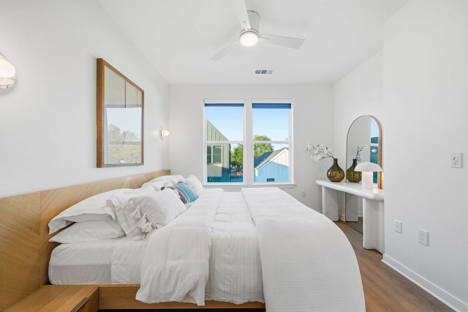 1941 Sawdust Road, Unit 3111 Spring, TX 77380 - Photo 20 of 24 a bedroom with a large bed and a chandelier