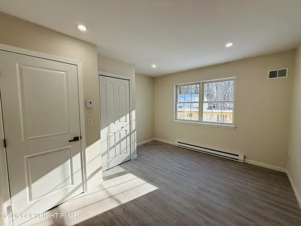 a view of a storage & utility room with a washer and dryer