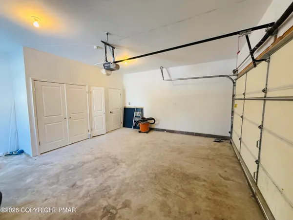 a view of swimming pool with sitting area