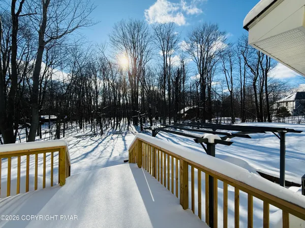 a view of street with yard and tree