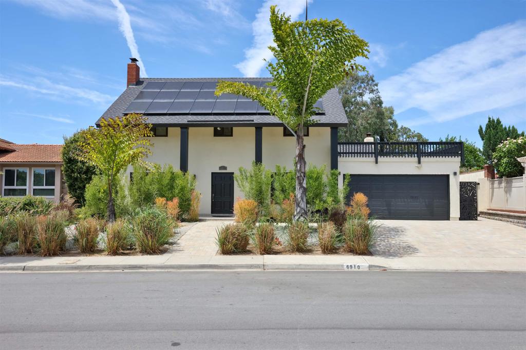 front view of a house with a street