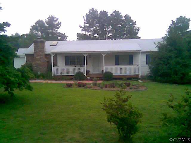 7900 Holdsworth Road Disputanta, VA 23842 - Photo 1 of 1 a front view of a house with a yard