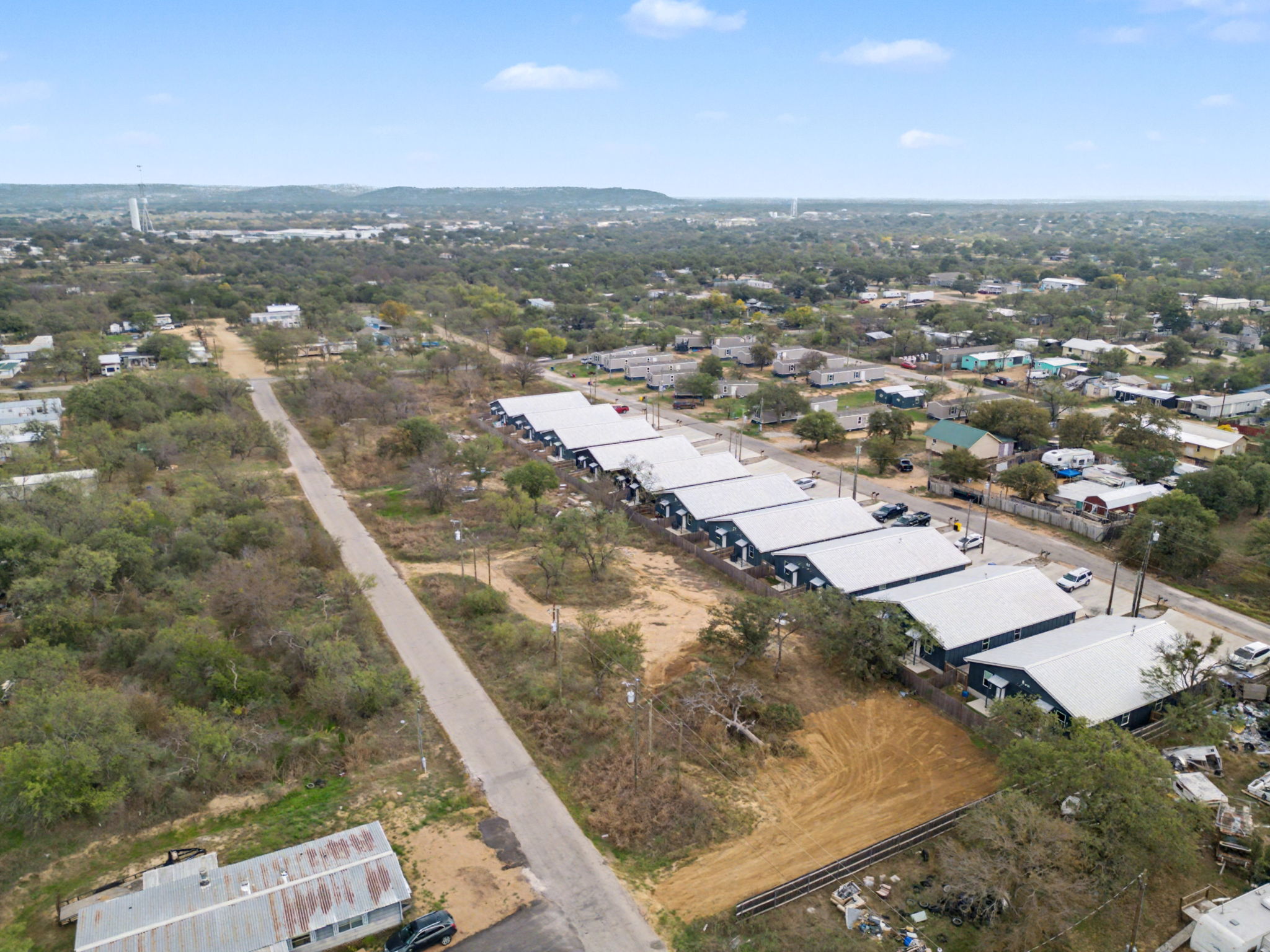 870 Waco Street Kingsland, TX 78639 - Photo 26 of 30 an aerial view of residential houses with outdoor space