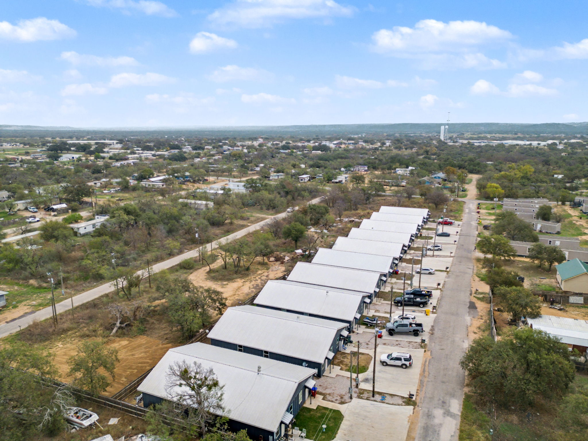870 Waco Street Kingsland, TX 78639 - Photo 5 of 30 an aerial view of a city with lots of residential buildings